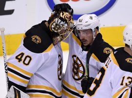 The Boston Bruins celebrate their first-round Stanley Cup Playoff victory over the Toronto Maple Leafs. (Image: USA Today Sports)