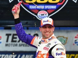 Denny Hamlin became the third driver this season to win his second race, and he did so despite two penalties. (Image: Getty)