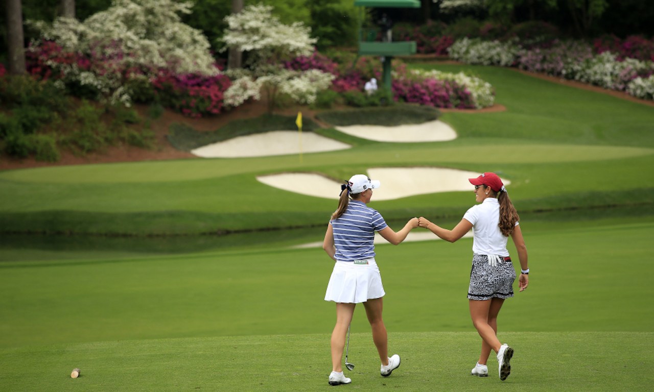 Jennifer Kupcho of the United States and Maria Fassi of Mexico fist bump on the No. 12 hole during the final round of the Augusta National Women's Amateur. (Image: Courtesy of Augusta National)