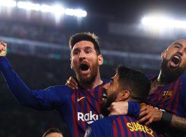 Lionel Messi (left) celebrates with teammates after Barcelona took a 2-0 lead over Liverpool in their Champions League semifinal match. (Image: Alex Caparros/UEFA/Getty)