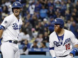 Cody Bellinger (left) of the Dodgers celebrates a home run with Justin Turner (right) during a game against the Pittsburgh Pirates at Dodger Stadium in LA. (Image: Marcio Jose Sanchez/AP)
