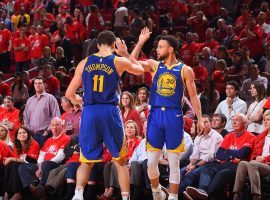 Klay Thompson (left) and Steph Curry (right) lead the Golden State Warriors to a series win in Game 6 against the Houston Rockets in Houston, Texas. (Image: Bill Baptist/Getty)