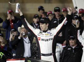 Brad Keselowski took the lead late and then held on in a shootout to win at Kansas Speedway on Saturday. (Image: Orlin Wagner/AP)