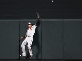 Baltimore Orioles outfielder Stevie Wilkerson fails to snag a home run hit by Clint Frazier of the New York Yankees at Camden Yards in Baltimore, MD. (Image: Nick Wass/AP)