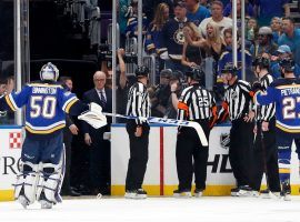 St. Louis Blues players argue with referees after the San Jose Sharks score the game winning goal in overtime of Game 3 of the Western Conference finals. (Image: Jeff Roberson/AP)