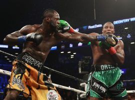 Deontay Wilder (left) will mace Luis Ortiz (right) in a rematch of their thrilling 2018 fight. (Image: Al Bello/Getty)