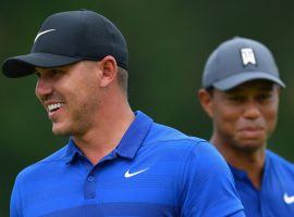 It seems no matter what Brooks Koepka accomplishes, Tiger Woods is in the background casting a large shadow. (Image: Getty)