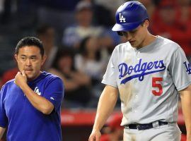 Corey Seager (right) will likely miss up to six weeks with what the Dodgers believe is a Grade 2 hamstring strain. (Image: Getty)