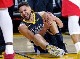 Klay Thompson of the Golden State Warriors grabs his knee after blowing out his ACL in game 6 of the 2019 NBA Finals against the Toronto Raptors. (Image: Getty)
