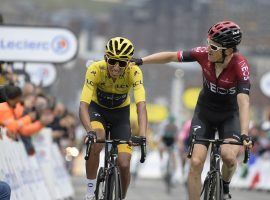 Geraint Thomas (right) congratulates teammate Egan Bernal (left) on retaining the yellow jersey and locking up a victory in the 2019 Tour de France as they cross the finish line at Stage 20 in Val Thorens. (Image: Sunada)