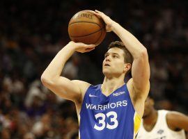 Jimmer Fredette of the Golden State Warriors shoots a free throw against the Sacramento Kings in a NBA summer league game in Sacramento. (Image: Rich Pedroncelli/AP)