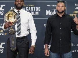 Jon Jones (left) will defend his light heavyweight title against Thiago Santos at UFC 239 on Saturday. (Image: MMAFighting.com)