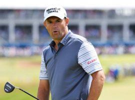 Padraig Harrington called out Tiger Woods for not playing in a tournament the week before the Open Championship. (Image: Getty)