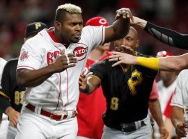 Teammates from the Cincinnati Reds try to restrain Yasiel Puig during a brawl against the Pittsburgh Pirates in Cincinnati. (Image: Getty)