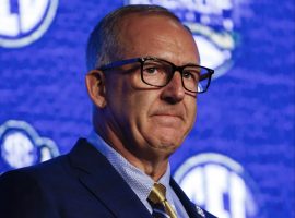 Southeastern Conference commissioner Greg Sankey speaks during the NCAA college football Southeastern Conference Media Days, Monday, July 15, 2019, in Hoover, Ala. (Image: Butch Dill/AP)