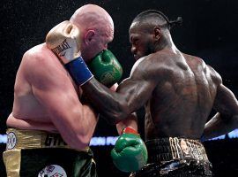 Tyson Fury (left) and Deontay Wilder (right) will face off in February in a rematch of their thrilling split decision draw from 2018. (Image: Harry How/Getty)