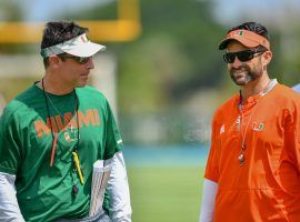 Dan Enos, left, was hired by Miami Hurricane coach Manny Diaz to run the offense. (Image: Getty)