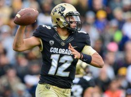 BOULDER, CO - OCTOBER 28:  Quarterback Steven Montez #12 of the Colorado Buffaloes passes against the California Golden Bears at Folsom Field on October 28, 2017 in Boulder, Colorado.  (Photo by Dustin Bradford/Getty Images)