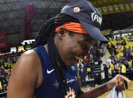 Jonquel Jones celebrates after the Connecticut Sun clinched a spot in the WNBA Finals on Sunday. (Image: Andrew D. Bernstein/NBAE/Getty)