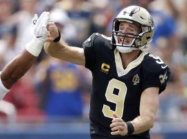 New Orleans QB Drew Brees injures his thumb during a pass against the LA Rams in Week 2. (Image: Sean M. Haffey/Getty)