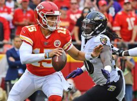 Kansas City QB Patrick Mahomes evades a blitzer in a Chiefs victory over the Baltimore Ravens at Arrowhead Stadium. (Image: Jamie Squire/Getty)