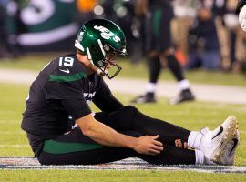 NY Jets backup QB Trevor Siemian clutches his injured ankle in the second quarter of a Monday Football loss to the Cleveland Browns. (Image: Porter Lambert/Getty)