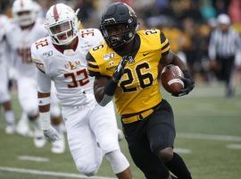 Appalachian State RB Marcus Williams Jr. escapes from a Louisiana Monroe defender during a blowout victory in Boone, NC. (Image: Brian Blanco/AP)