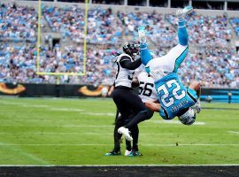 Carolina Panthers RB Christian McCaffrey flips into the end zone in a win over the Jacksonville Jaguars. (Image: Jacob Kupferman/Getty)