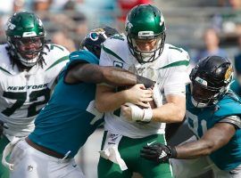 Jacksonville Jaguars defenders Josh Allen (left) and Yannick Ngakoue (right) share a sack against New York Jets quarterback Sam Darnold. (Image: Reinhold Matay/USA Today Sports)