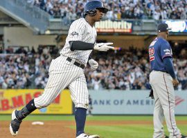 Yankees SS Didi Gregorious rounds the bases after crushing a grand slam in Game 2 of the ALDS against the Minnesota Twins at Yankee Stadium in the Bronx. (Image: Getty)