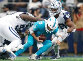 The Dallas Cowboys swarm Miami Dolphins QB Josh Rosen. (Image: Tim Heitman/USA Today Sports)