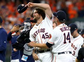 Manager AJ Hinch hugs winning pitcher Gerrit Cole after the Astros defeated the Tampa Bay Rays in the 2019 ALDS. (Image: Bob Levy/Getty)