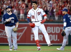 Washington Nationals OF Juan Soto celebrates after a bases-clearing RBI single but the Nats ahead of the Milwaukee Brewers in the 2019 NL Wild Card. (Image: Getty)