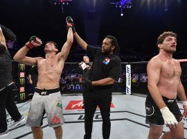 Demian Maia (left) defeated Ben Askren (right) in Singapore on Saturday in a battle between two of the world’s top grapplers. (Image: Jeff Bottari/Zuffa/Getty)