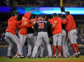 Max Scherzer and his Washington Nationals teammates celebrate defeating the LA Dodgers in Game 5 of the 2019 NLDS at Dodger Stadium. (Image: Mark J. Terrill/AP)