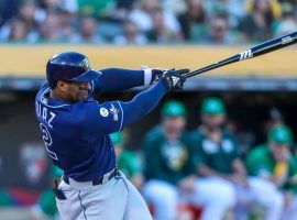 Tampa Bay Rays Yandy Diaz connects on a home run in the AL Wild Card game against the Aâ€™s in Oakland. (Image: Dirk Shadd/Tampa Times)