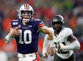 Auburn quarterback Bo Nix likes to run with the football, and should be doing plenty of it on Saturday against Arkansas. (Image: Getty)