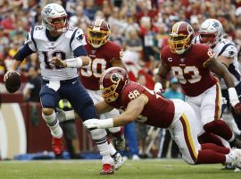New England Patriots quarterback Tom Brady led his team to its fifth straight victory by defeating the winless Washington Redskins, 33-7. (Image: AP)