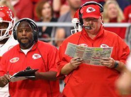 Kansas City coach Andy Reid, right, might be losing his offensive coordinator Eric Bieniemy, who is a leading candidate for the Washington Redskins coaching vacancy after Jay Gruden was fired.