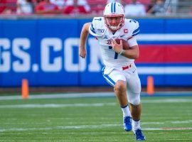 SMU quarterback Shane Buechele has shown his is just as adept running the ball as he is passing it. (Image: Dallas Morning News)