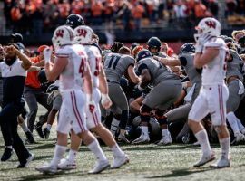 Wisconsin fell seven spots in the AP College Football Top 25 Poll after this devastating loss to Illinois last Saturday. (Image: AP)