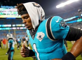 Carolina Panthers quarterback Cam Newton jogs off the field after the end of a game in Charlotte, NC. (Image: Getty)