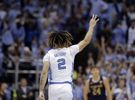 North Carolina freshman guard Cole Anthony celebrates hitting a three-pointer in a comeback victory over Notre Dame in Chapel Hill, NC. (Image: Gerry Bloom/AP)