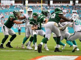 NY Jets quarterback Sam Darnold is harassed by the Miami Dolphins during a loss at Hard Rock Stadium. (Image: Getty)