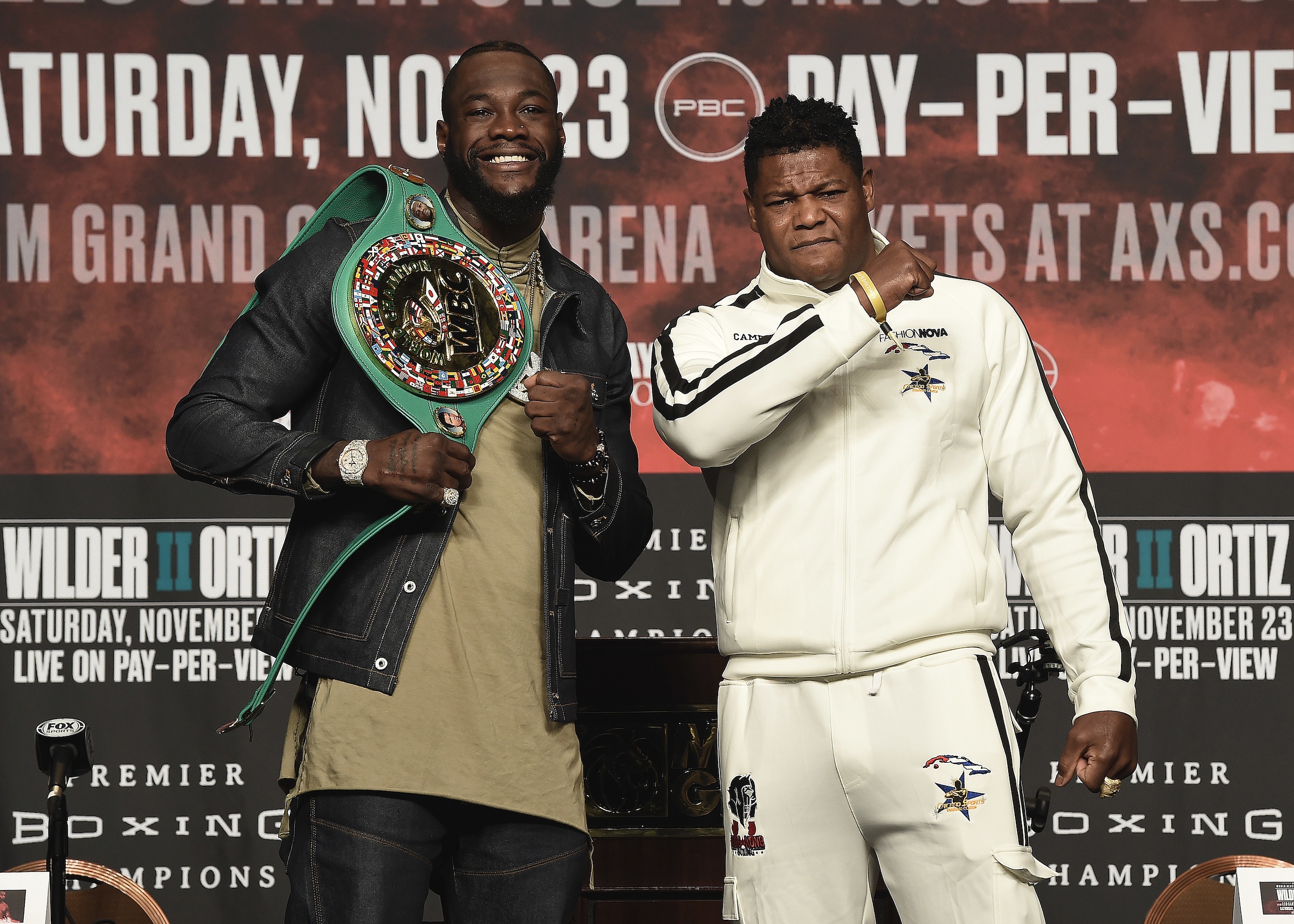 Heavyweight champion Deontay Wilder poses with challenger Luis Ortiz at the final press conference before Wilder-Ortiz II on Saturday at MGM Garden Arena in Las Vegas. (Image: Scott Kirkland/Fox Sports)
