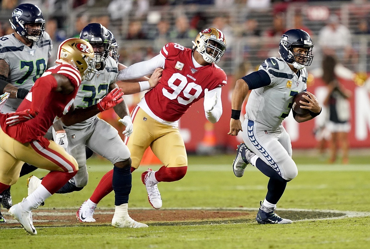 Seattle Seahawks QB Russell Wilson escapes a pass rush from the San Francisco 49ers at Levi Stadium in Santa Clara, CA. (Image: Thearon W. Henderson/Getty)