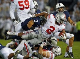 Ohio State defeated Penn State on Saturday, and were rewarded with the No. 1 spot in the College Football Playoff Rankings over LSU. (Image: Getty)