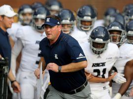 Rice head coach Mike Bloomgren leads the Owls onto the field at Southern Mississippi in 2018. (Image: Chuck Cook/USA Today Sports)