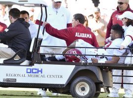 Alabama quarterback Tua Tagovailoa is carted off the field after an injury in the second quarter against the Mississippi State Bulldogs. (Image: Matt Bush/USA Today Sports)