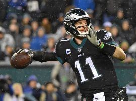 Philadelphia Eagles QB Carson Wentz drops back to pass against the New York Giants in Week 14. (Image: Emilee Chinn)